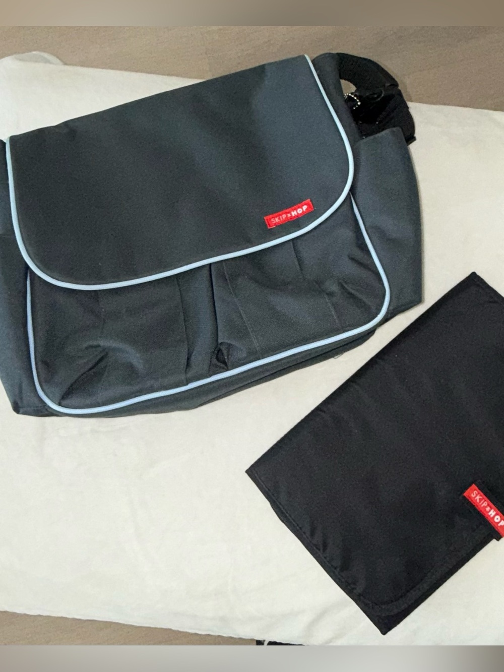 Skip Hop Black Messenger Bag with Light Blue Piping